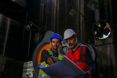 blue-collar-workers-work-together-at-metal-factory-2025-06-30-19-28-20-utc-1-.jpg